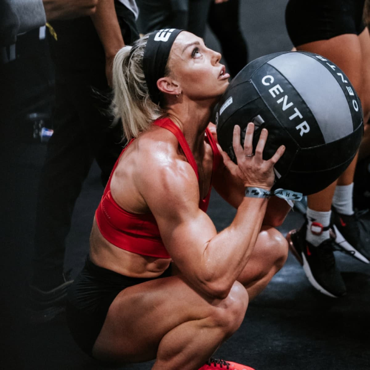 Athlete performing a wall ball with Centr x HYROX equipment