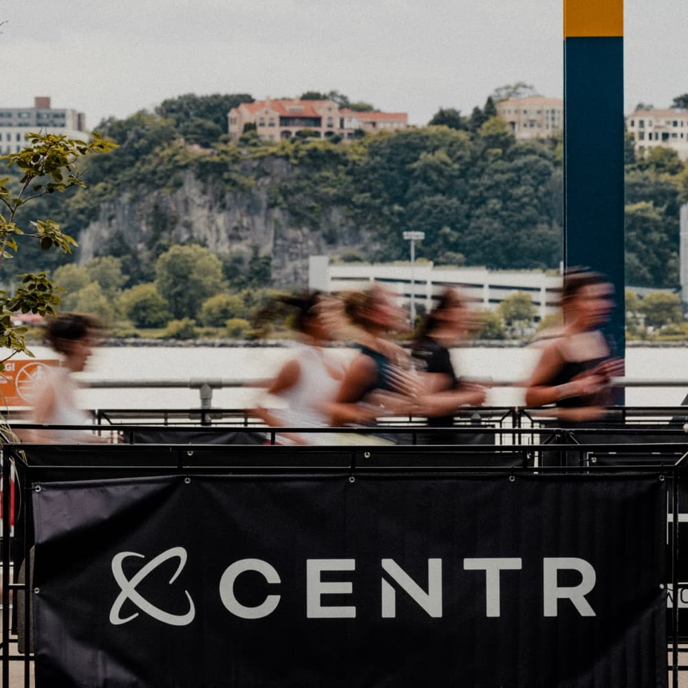 Runners competing at a HYROX event